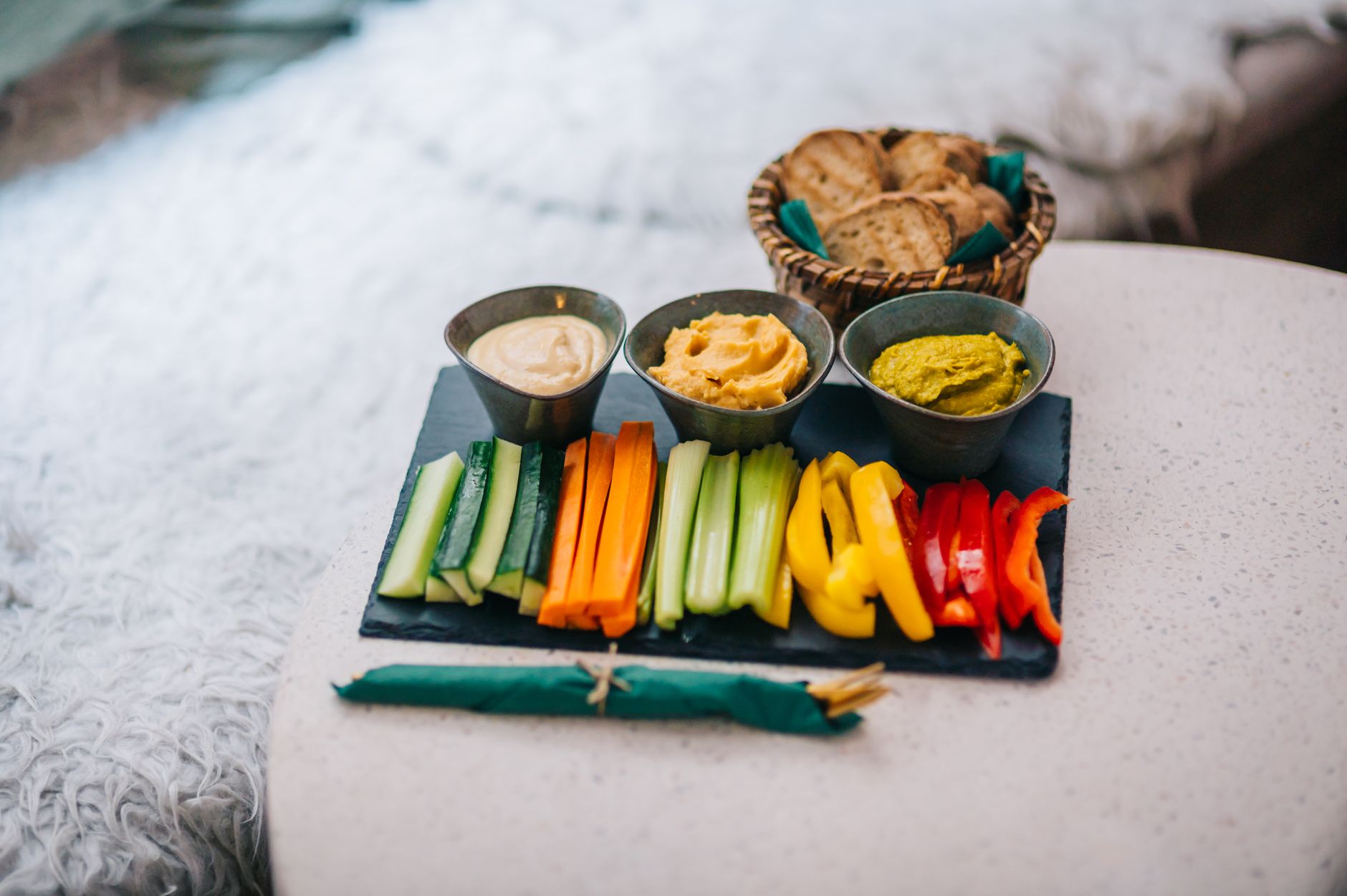 Healthy Mediterranean snacks with nuts, vegetables and hummus